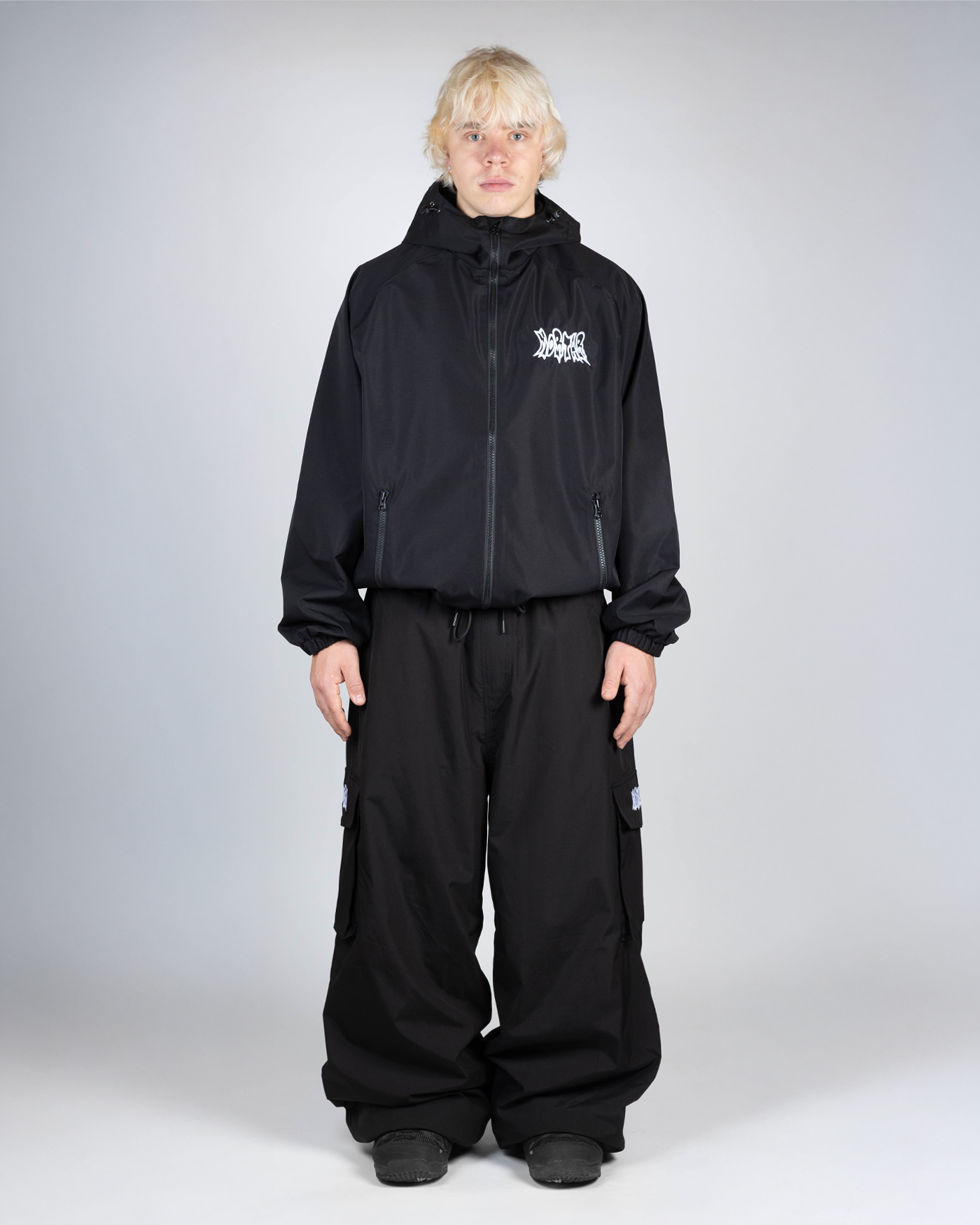 Black baggy snowpants full front view on a man