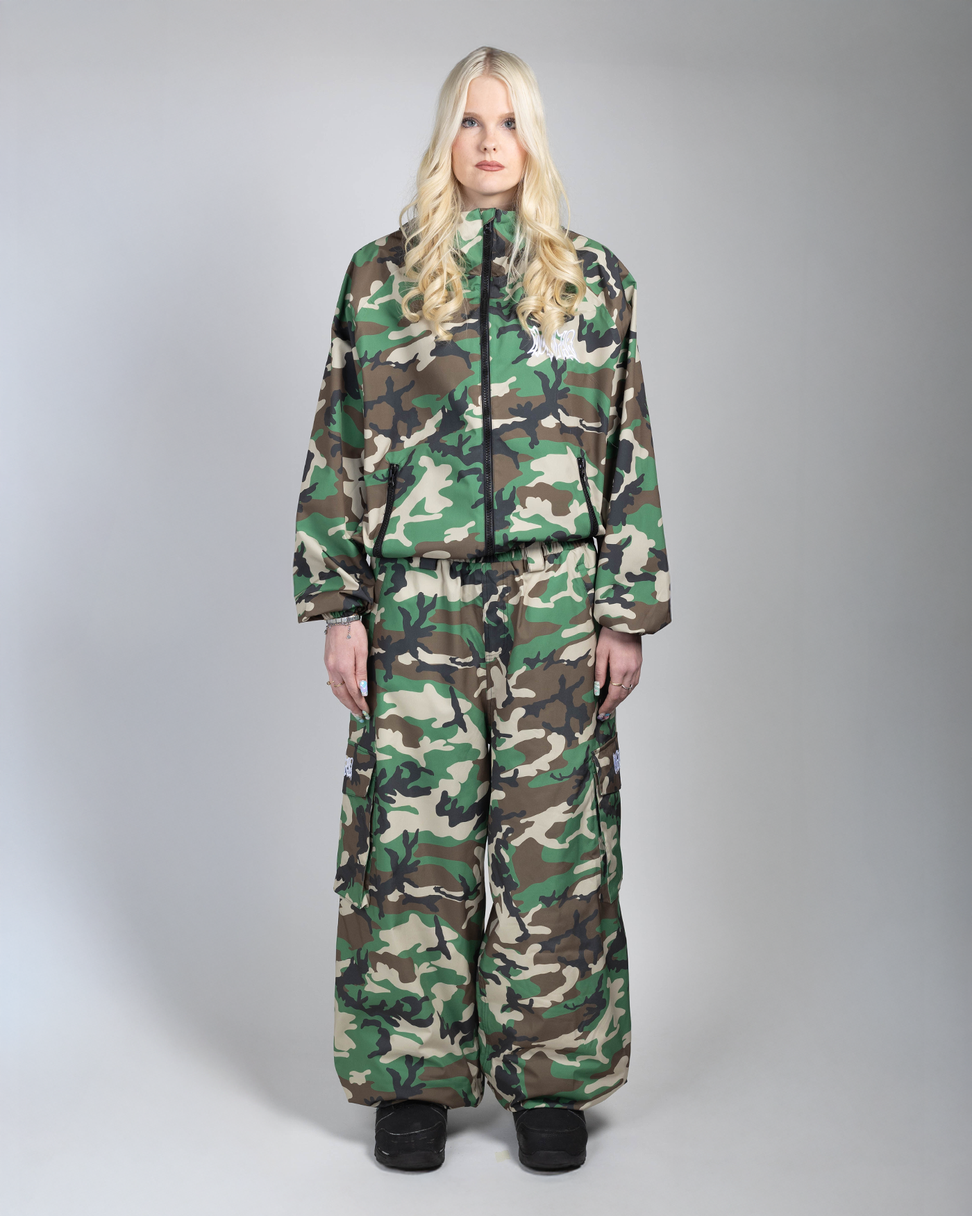 Camo snow jacket full front view on a woman (she's 175cm wearing size L)