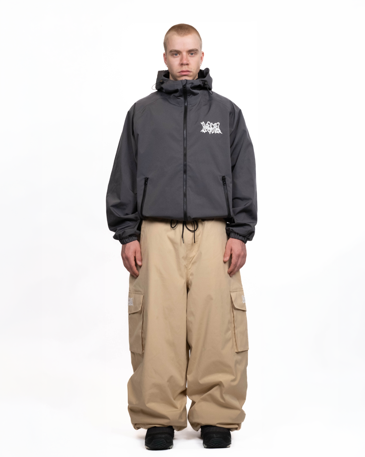 Dark grey snow jacket front view on a man
