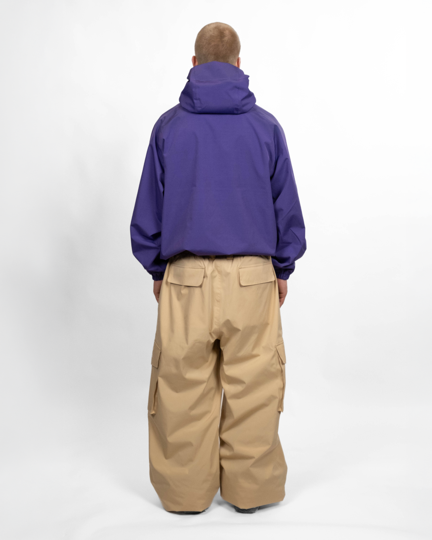 Purple snow jacket back view on a man 