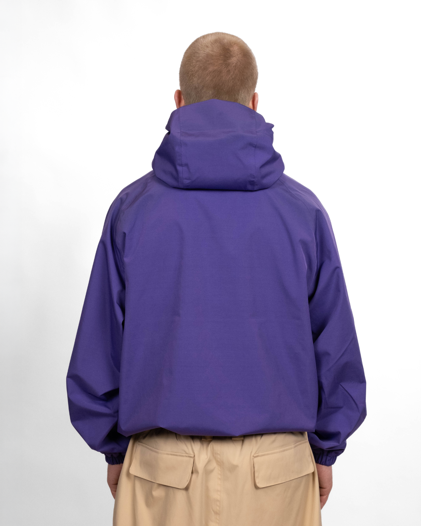 Purple snow jacket back view on model 